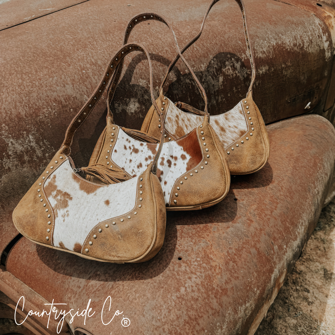Rodeo Royalty Cowhide Purse by Countryside Co.