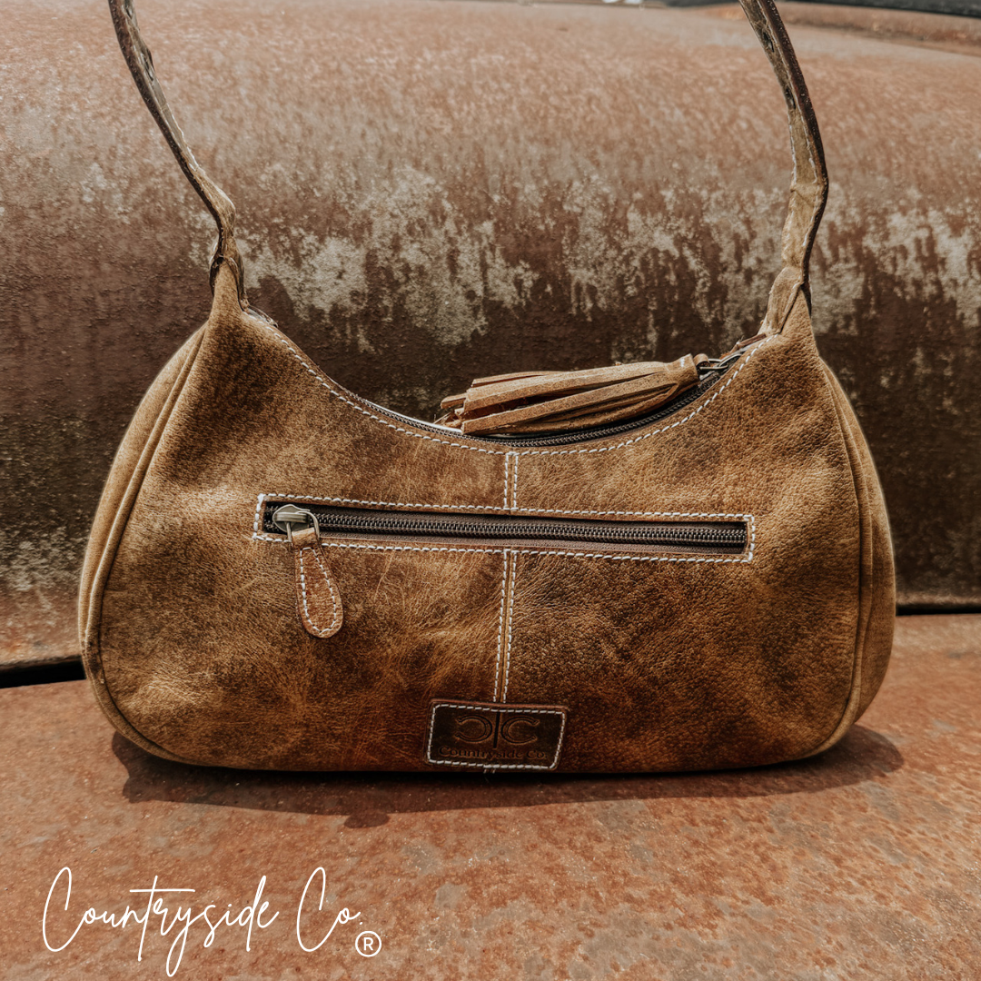 Rodeo Royalty Cowhide Purse by Countryside Co.