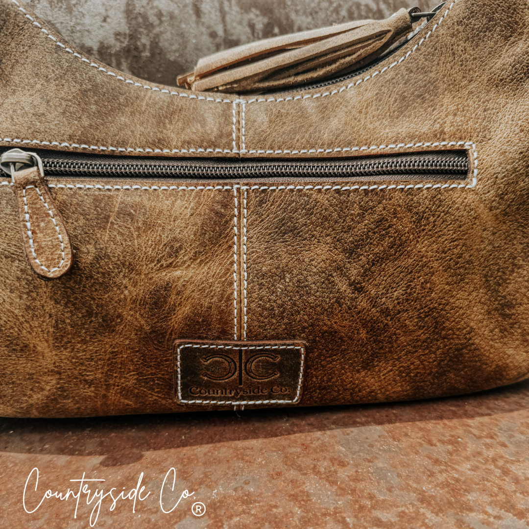 Rodeo Royalty Cowhide Purse by Countryside Co.