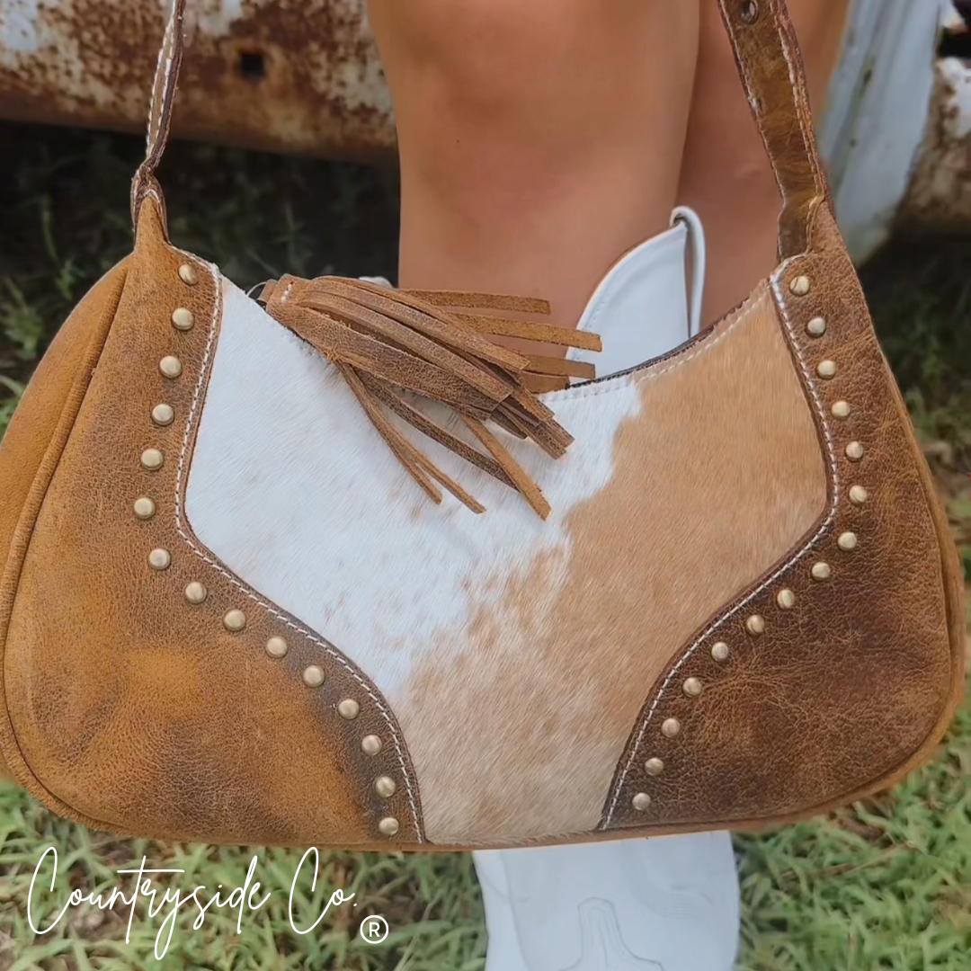 Rodeo Royalty Cowhide Purse by Countryside Co.