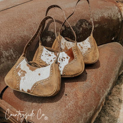 Rodeo Royalty Cowhide Purse by Countryside Co.